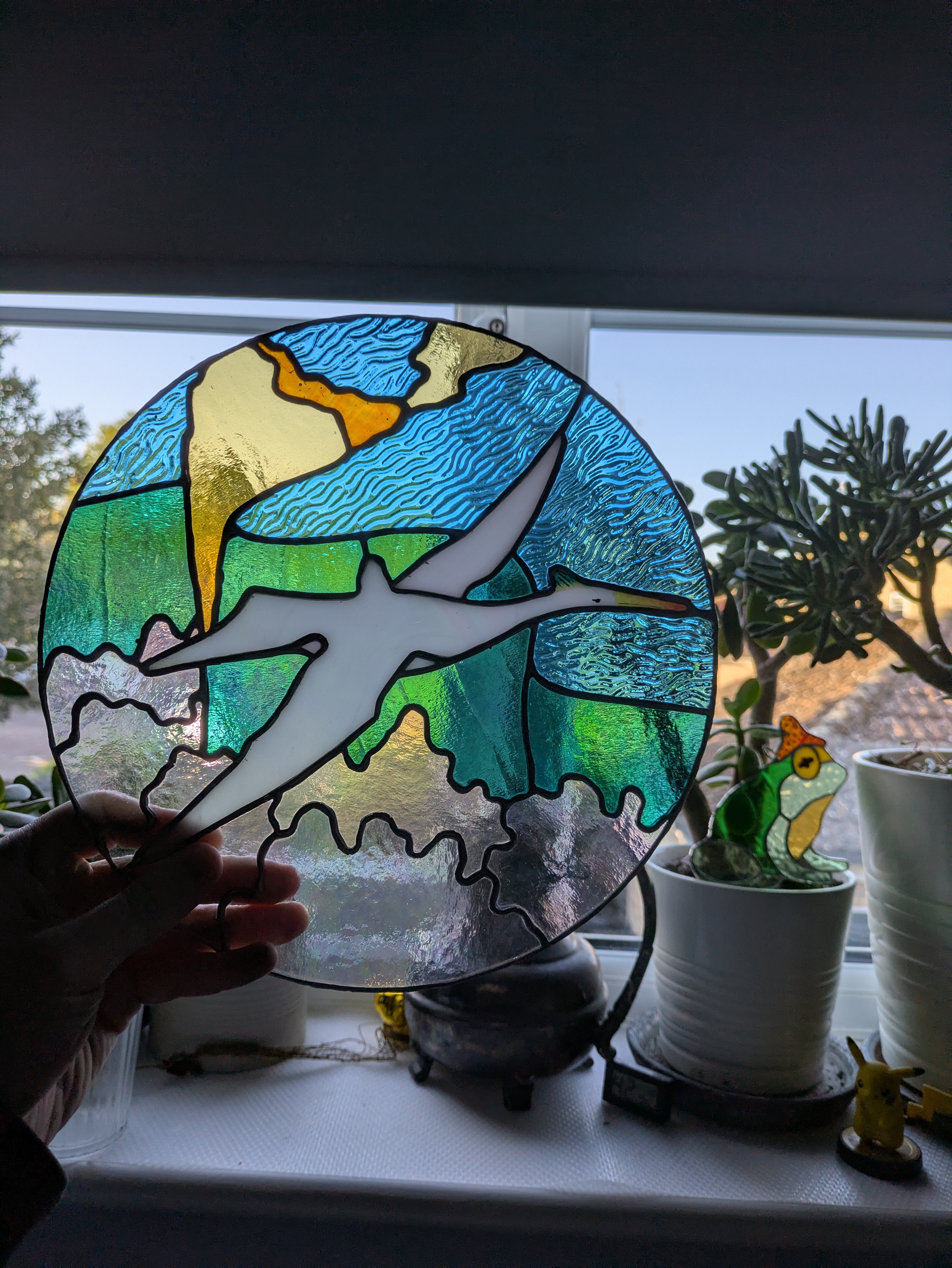 Finished stained glass sun panel photographed in landscape orientation